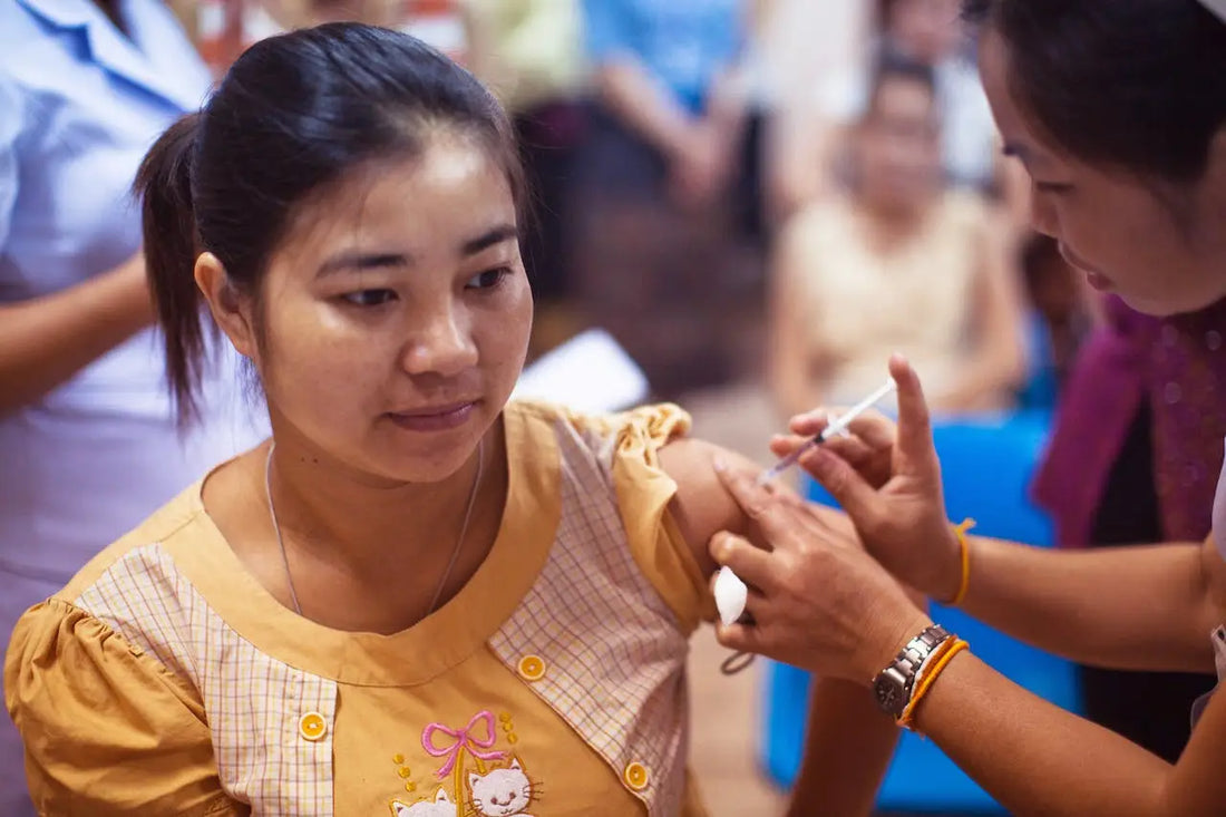 woman getting a vaccine